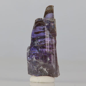 raw natural purple tanzanite crystal