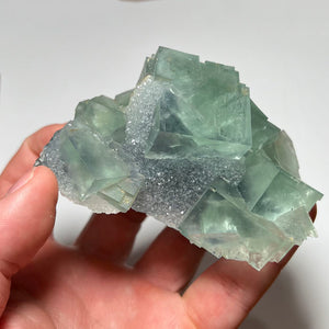 size of chinese green fluorite in hand