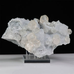 calcite crystals on silvery matrix