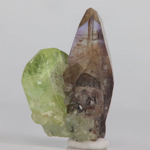 Unheated tanzanite crystal with green diopside from Tanzania