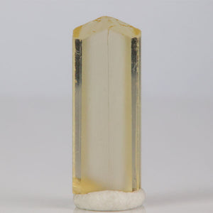 Rough natural yellow scapolite crystal
