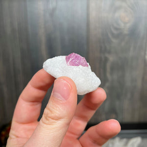 35g Pink Spinel Crystal on Marble