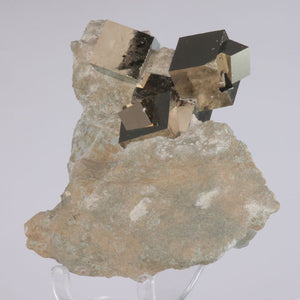 Pyrite Cube crystal cluster on limestone
