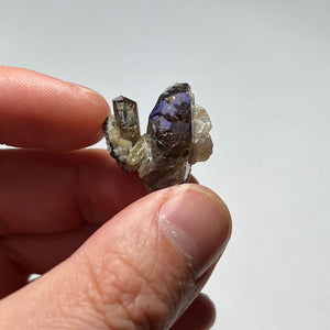 Raw tanzanite crystal cluster