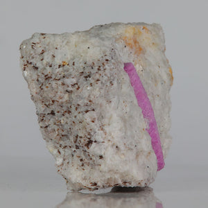 ruby in matrix with elongated pink crystal