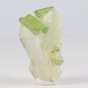 green tourmaline and quartz crystals