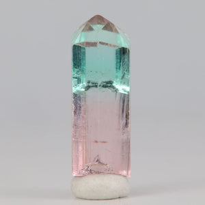 split pink and green tourmaline crystal raw