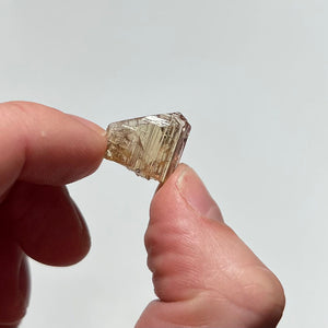 tanzanite crystal in hand