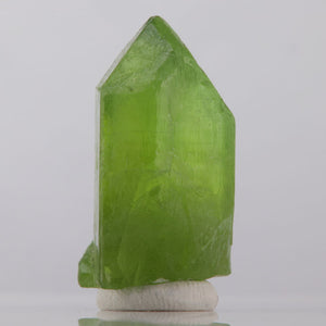 Rough peridot mineral specimen green