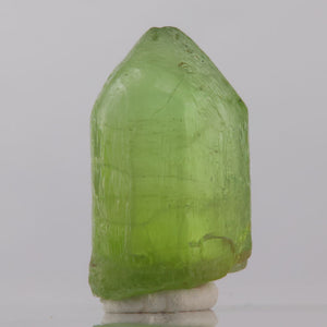 Green crystal on a white background
