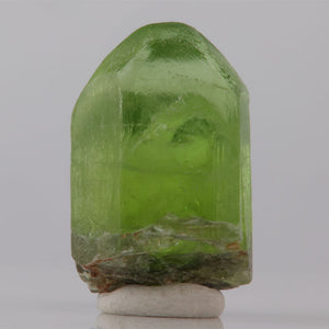 Green crystal on a white background