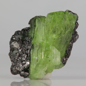 bright green diopside crystals with prismatic form