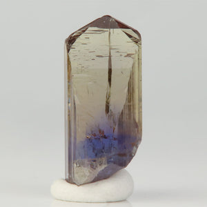 transparent zoisite crystal with natural color zoning