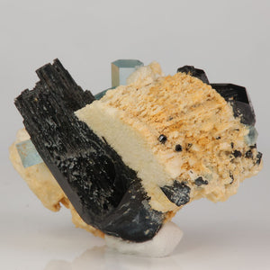 aquamarine crystal cluster with contrasting black schorl