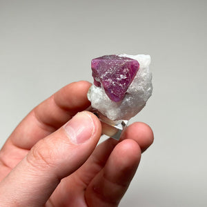 pink spinel crystal in white matrix specimen