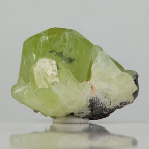 Tanzanian Diopside crystal with dark graphite matrix