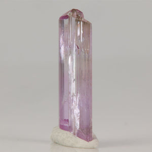 Tanzanite crystal showing pastel pink color and vertical striations