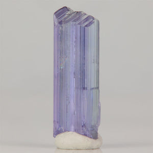 Tanzanite crystal specimen showing natural termination and light inclusions
