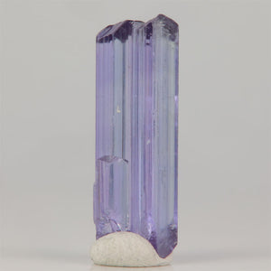 Unheated tanzanite crystal from Tanzania with violet blue color and prismatic form