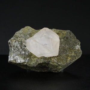 Fluorescent Calcite Crystal on Matrix