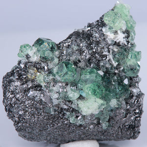 mint garnet crystals on host rock tanzania