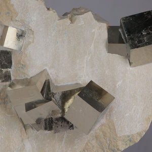 Raw Natural Pyrite Cubes on Matrix