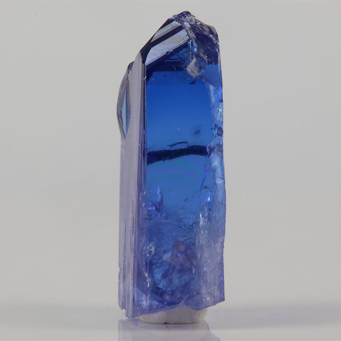 Gemmy tanzanite crystal elongated natural specimen