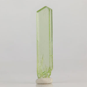 Green diopside crystal from Tanzania long slender mineral specimen