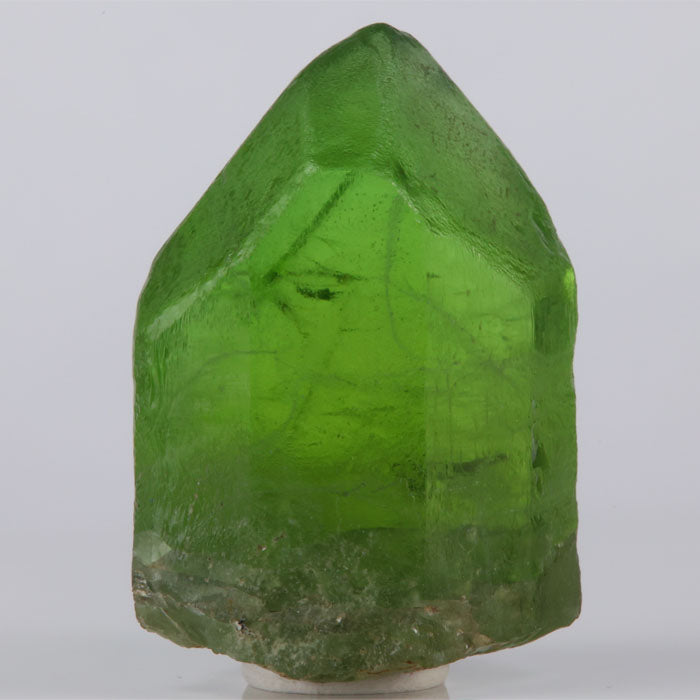 Massive peridot crystal with strong color and transparency