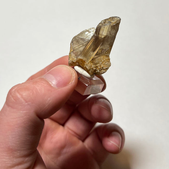 Natural diaspore crystals cluster with warm champagne color