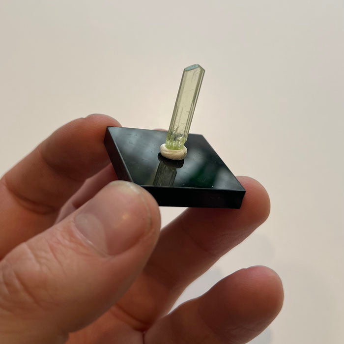 Green diopside crystal from Tanzania long slender mineral specimen