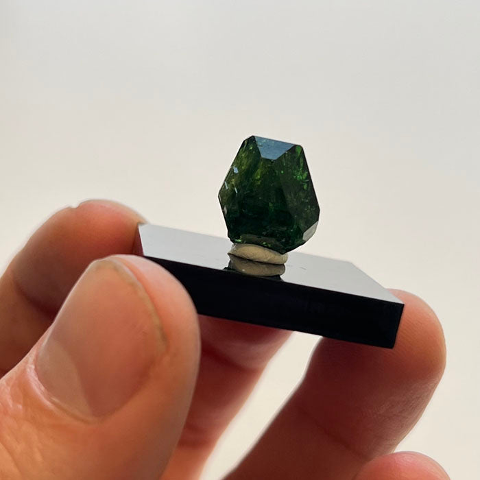 Neon green tourmaline crystal with strong color and transparency