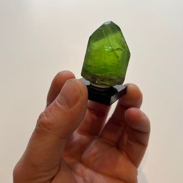 Large gemmy peridot crystal from Pakistan vivid green collector specimen