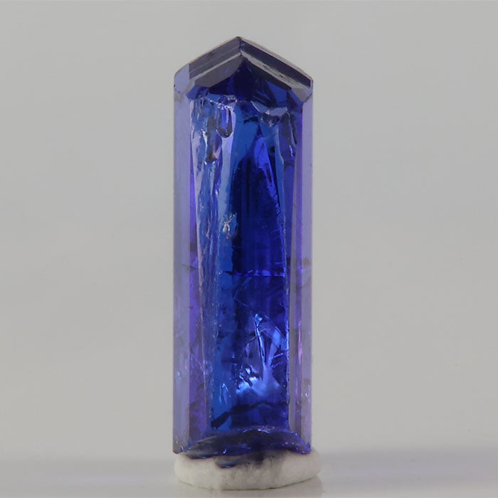 Highly saturated tanzanite crystal with rich color