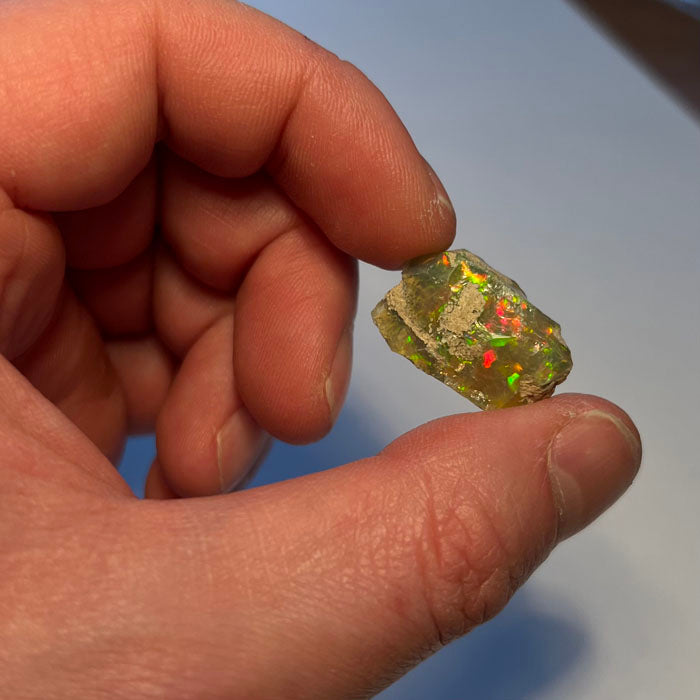 Raw Green yellow base opal specimen