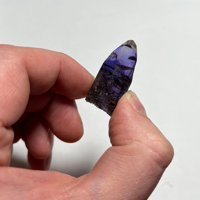 Natural unheated raw purple tanzanite crystal