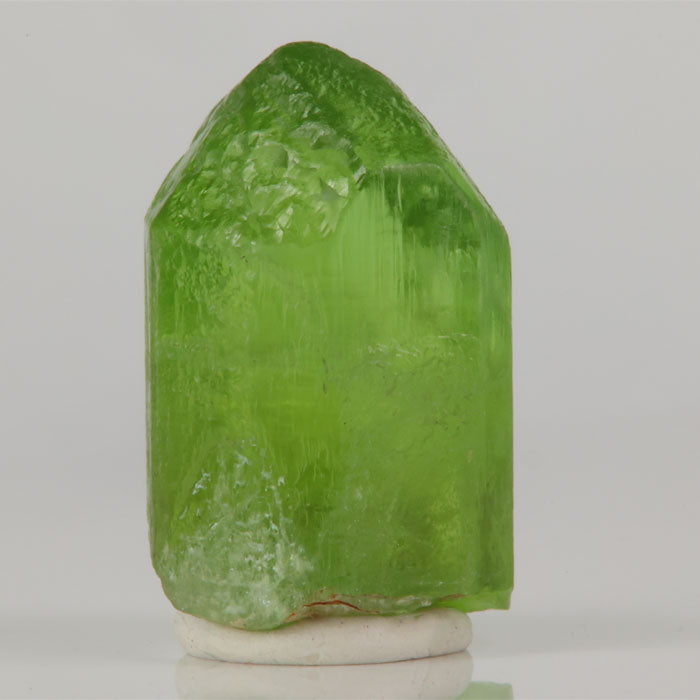 Peridot crystal from Pakistan bright green natural mineral specimen