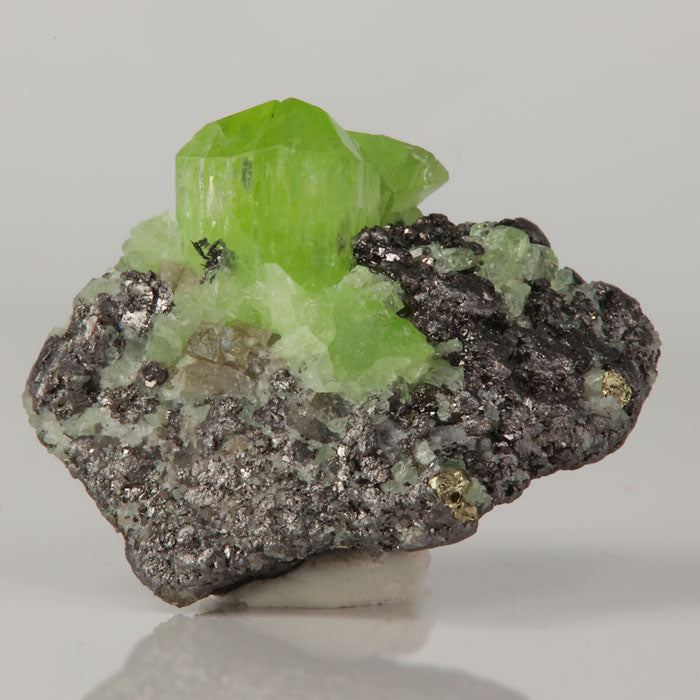 Bright green diopside crystal with dark matrix collector specimen