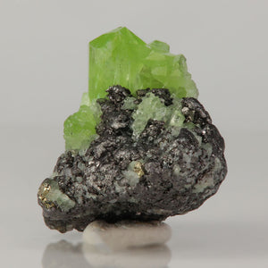 Diopside mineral on graphite matrix Tanzania natural specimen