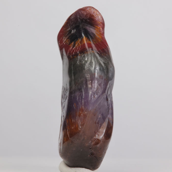 Raw natural color zoned quartz crystal