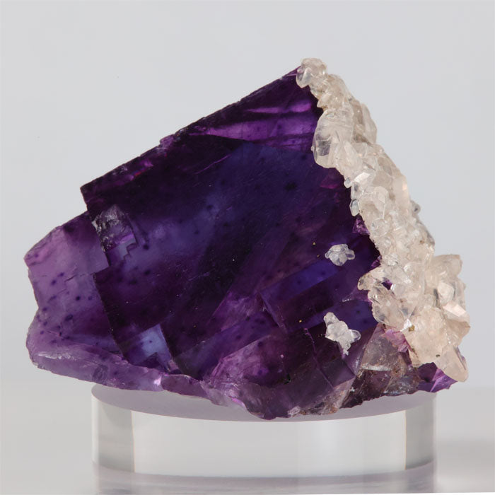 purple fluorite crystal with calcite