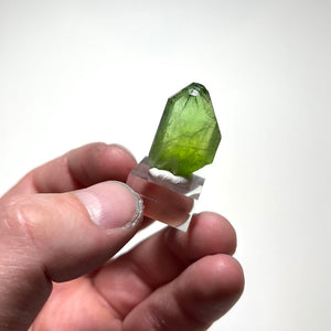 Green olivine peridot crystal translucent