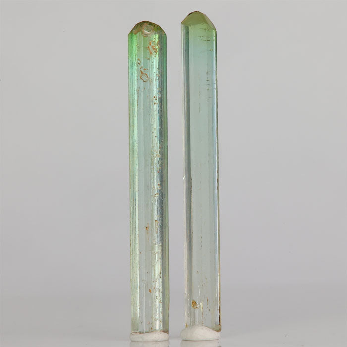Natural tourmaline pair elongated green crystals