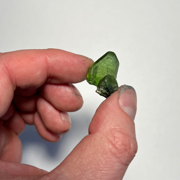35.32ct Peridot Crystal with Fine Ludwigite Needles