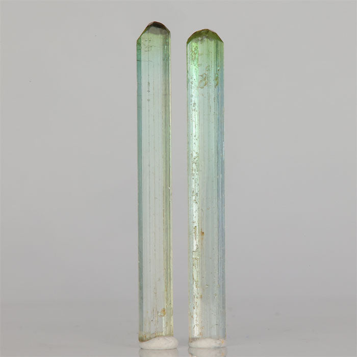 Long green tourmaline crystal pair Congo