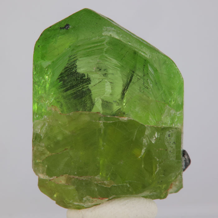 Rough green peridot crystal