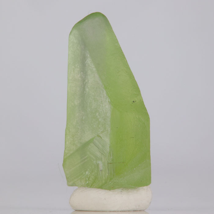 Rough green peridot crystal