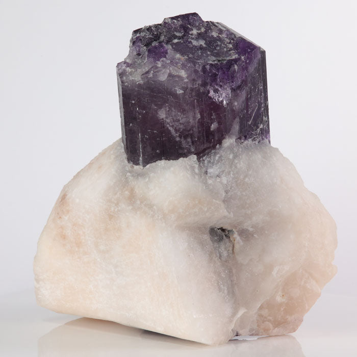 Scapolite crystal on a white background