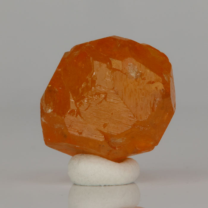 Tanzanian orange garnet crystal specimen