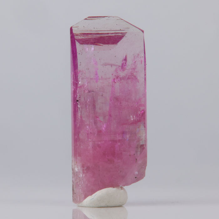 Pink crystal on a white background